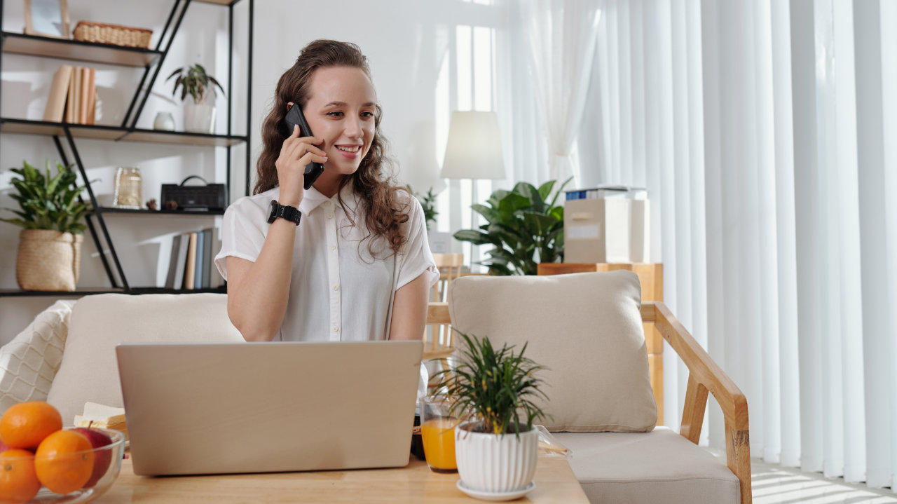 woman making work call from home